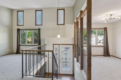 Dining room and living room - front door - lots of natural light here