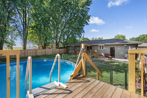 Pool included with sale & pool decking (black fencing around pool does not stay with home)