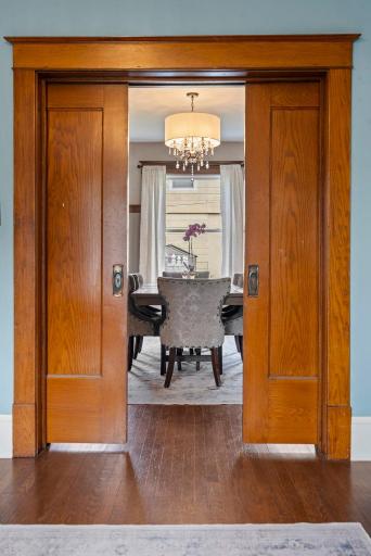 Original pocket doors closing off the office and dining room