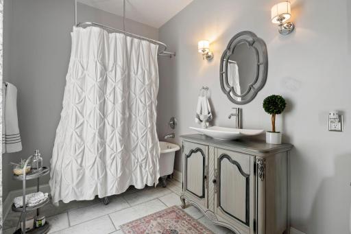 Main floor full bathroom with the original clawfoot tub