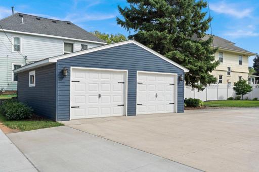 Detached 2-car garage with concrete driveway
