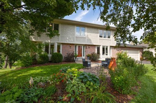 Stunning 5-bedroom, 4-bathroom home perfectly nestled on 0.61 acres in a highly sought-after Eden Prairie neighborhood