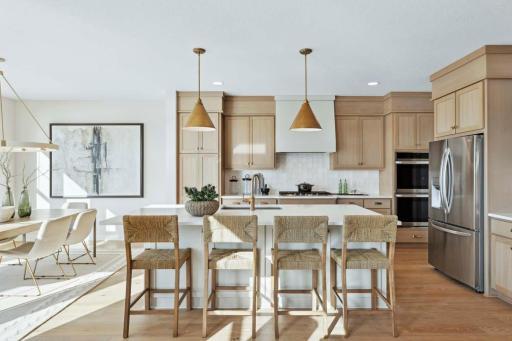 Enjoy Custom Oak Cabinetry, Upgraded Appliances and Ample Storage in this Kitchen