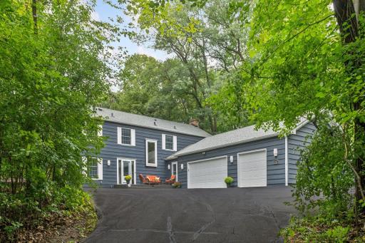 Welcome home to this beautiful two-story with a walkout lower level, located in the Wayzata School District.