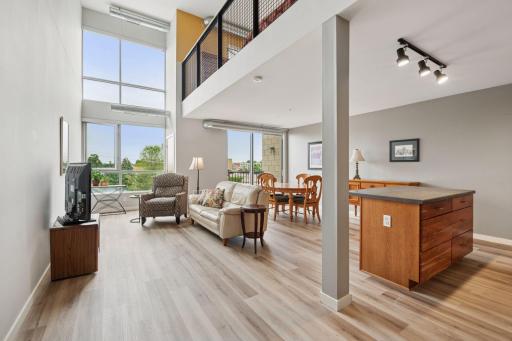 A light-filled living room with dramatic vaulted ceilings