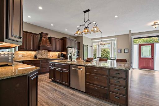 Photo for 5420 Riverwood Lane, Savage, MN 55378 - listing #6783604 The spacious kitchen has stainless steel appliances, updated lighting, granite countertops and newer flooring.