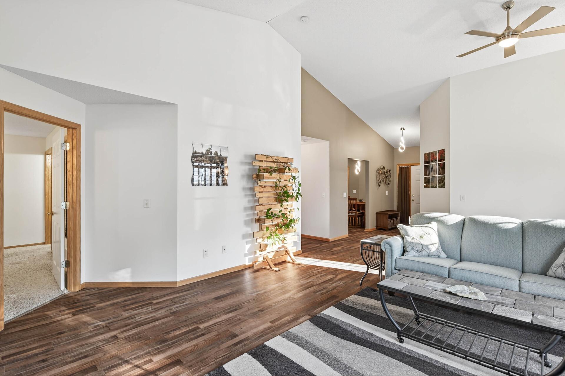 Great Room with Primary Bedroom on Left and Secondary Bath/Kitchen on Right