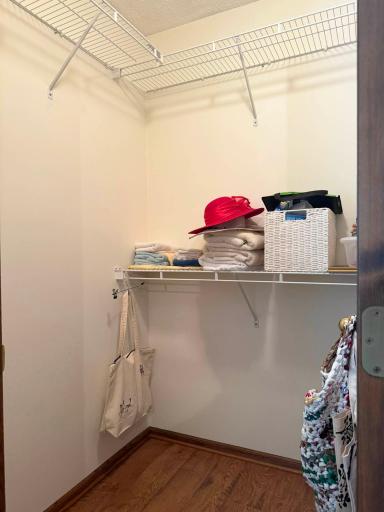 A shot of the walk-in closet in the second bedroom on the upper level.