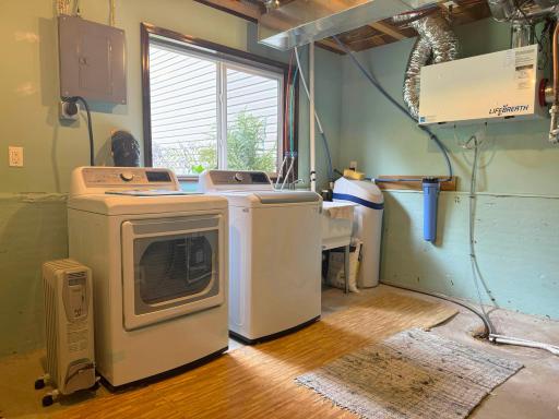A shot of the laundry and utility room. Literally a brand new Air Exchanger - just replaced!