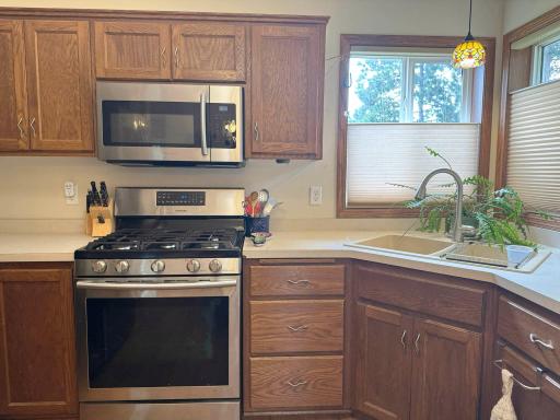 A closer look at the kitchen cabinetry and appliances.