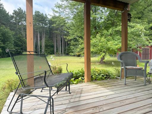 A shot of the patio and the backyard beyond.