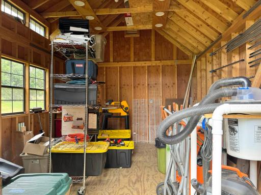 A peek inside the big shed. It has electrical wired in!
