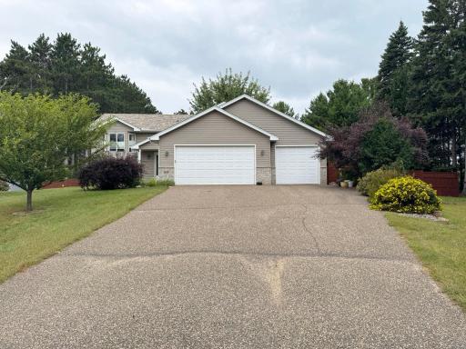 A look at the home and attached garage from the driveway.