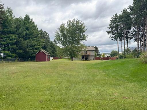 Looking back towards the home from the edge of the fenceline in the backyard.