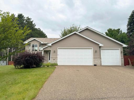 A shot of the home's exterior from the driveway.
