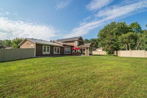 The backyard is flat, fenced and functional, with lots of space for games, hobbies or your ideas.