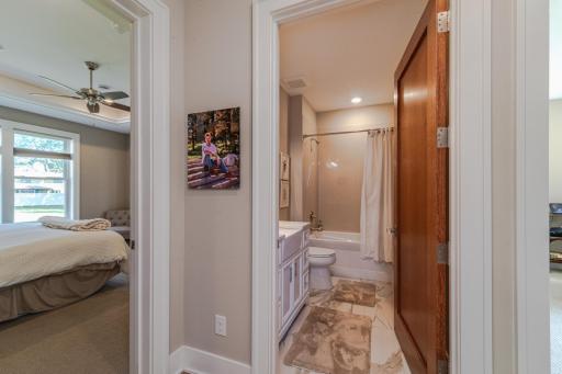 This full main floor bath is adjoined to the second bedroom, currently used as an office.