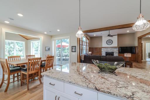 The eat-in dining room is adjoined to the kitchen and the four-season porch.