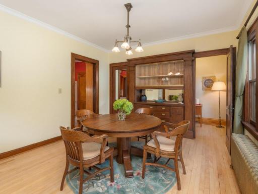 Handsome built-ins and vintage dining fixture