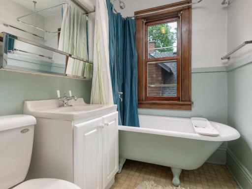 Full bath with some tasteful updates and original charm