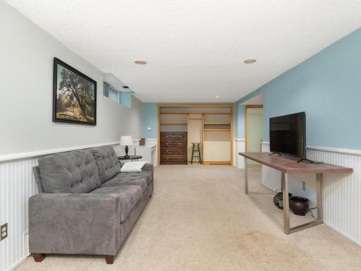 Large family room and closet - cozy wainscoting detail