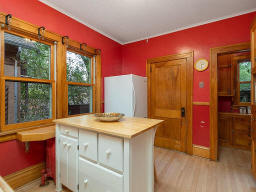 Door to mudroom and entrance to vintage pantry