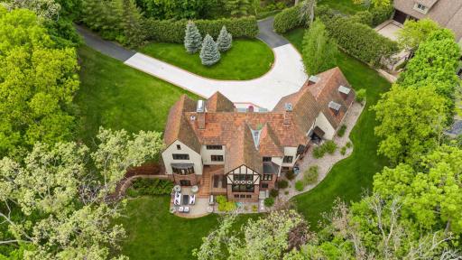 The circle drive into the property is secured by an entry gate.