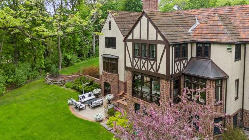 The property features a lovely back patio with private views of the yard.