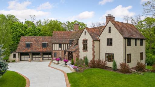 Greenery and mature landscaping surrounds the property.