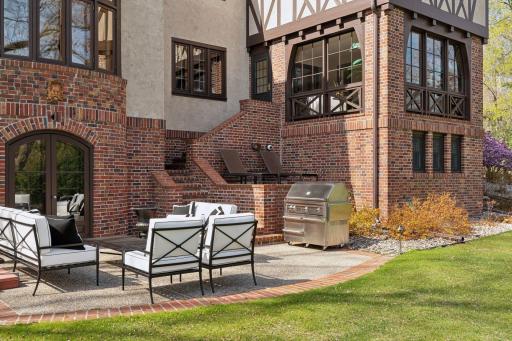 The property features a lovely back patio with private views of the yard.