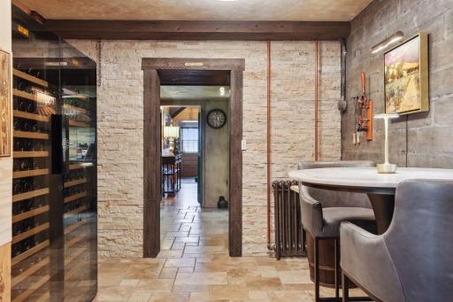 With the temperature-controlled wine cellar just steps away, enjoy the adjacent tasting room and additional wine coolers.