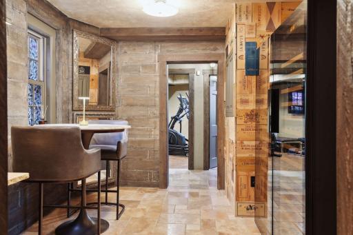 With the temperature-controlled wine cellar just steps away, enjoy the adjacent tasting room and additional wine coolers.