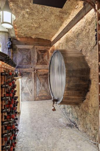 A peek into the temperature-controlled wine cellar with many unique features.