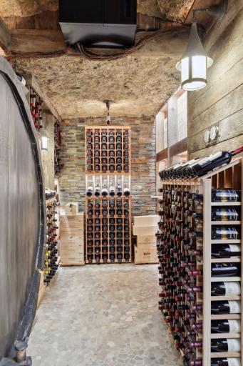 The temperature-controlled wine cellar can hold hundreds of your favorite bottles of wine.