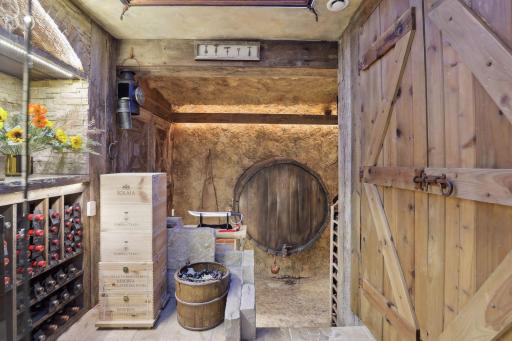 A peek into the temperature-controlled wine cellar with many unique features.