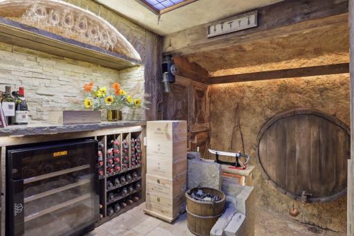 A peek into the temperature-controlled wine cellar with many unique features.