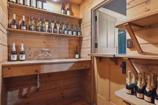 The wet bar with a dutch door making a evening party with quests feel sophisticated.