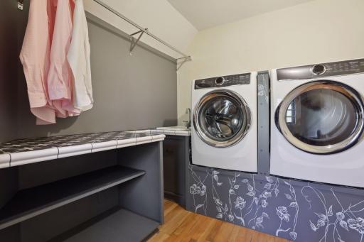 The laundry is located on the upper level.