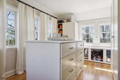 The second bedroom features a large walk-in closet with custom built-ins.