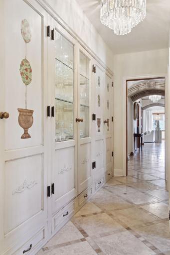 Your eyes will draw you to the many stylish features of the home including the archways, light fixtures, floor details, and so much more.