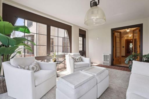 The veranda is located off of the foyer with wonderful views of the backyard.