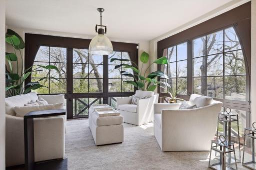 The veranda is located off of the foyer with wonderful views of the backyard.