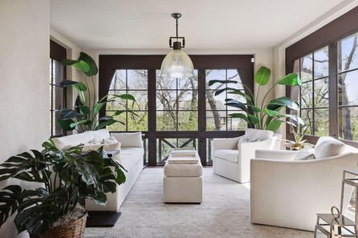 The veranda is located off of the foyer with wonderful views of the backyard.