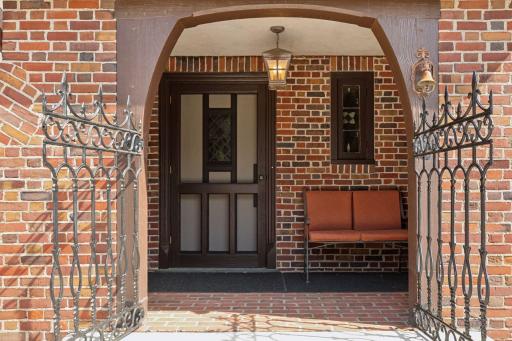 Details like this gate leading up to the front entry door show the history of the property.