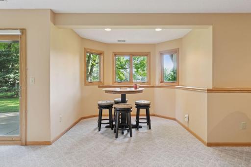 The lower-level recreation room includes a versatile nook that can serve as a game area, reading corner, or homework station.