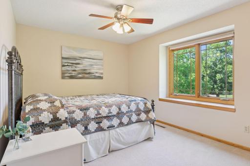 Four spacious bedrooms are located on the upper level.