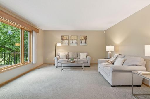 Spacious family room offering ample room for all your furniture and gatherings.