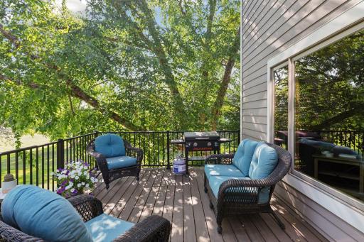 Step out onto the maintenance-free Trex deck and take in stunning, sweeping views of your vast private backyard and the lush, rolling fairways of the golf course-an inspiring backdrop for every moment spent outdoors.
