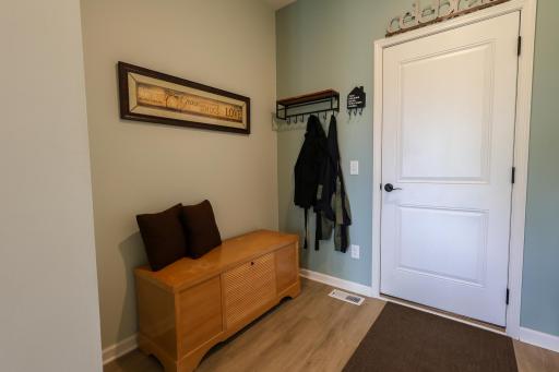 Mud room closet with Elfa closet system to keep it all organized!