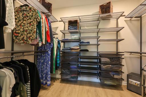 Fully adjustable Elfa closet system! This primary walk-in closet is huge!